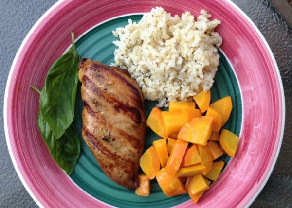 Easy Teriyaki Chicken plated with rice and carrots.