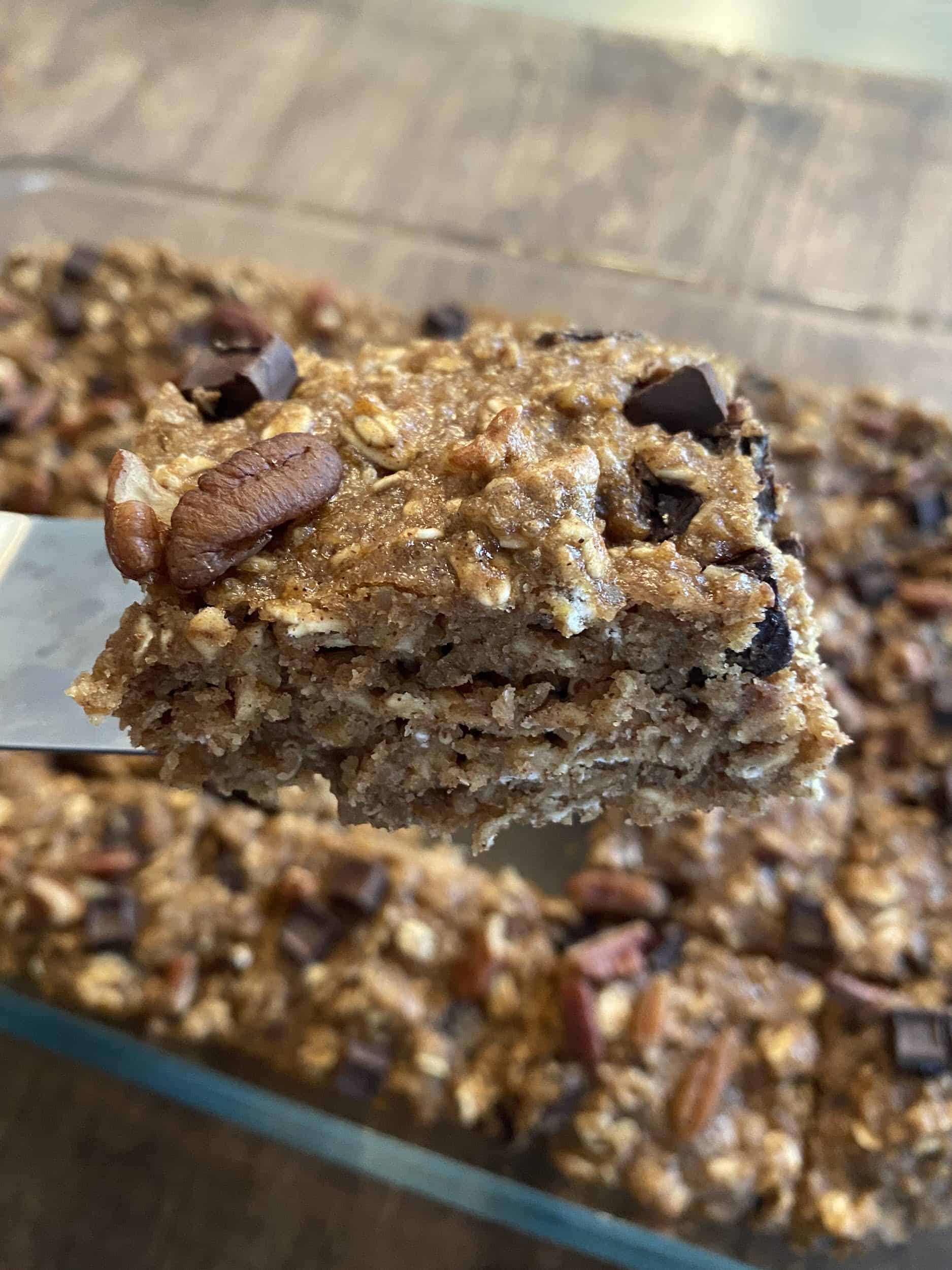 A single quinoa breakfast bar on a spatula