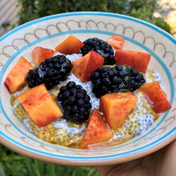 Chia pudding with nectarines and blackberries